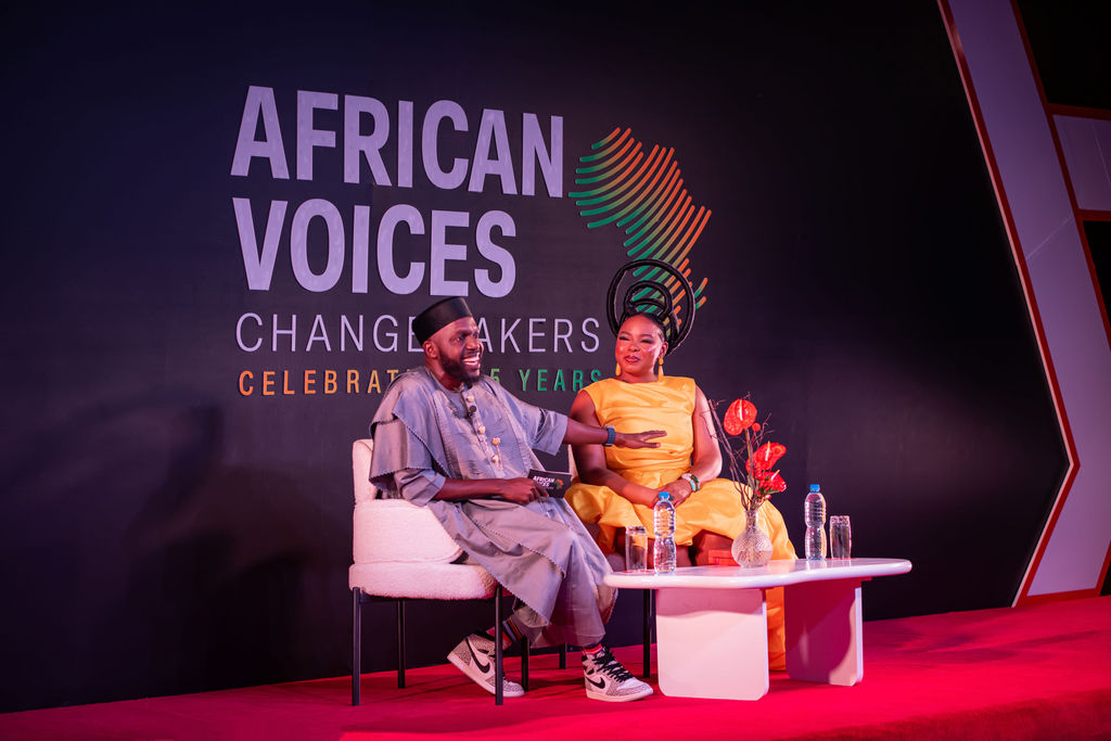 CNN's Larry Madowo and singer Yemi Alade on stage at an event in Lagos to celebrate African Voices' 15 year anniversary.